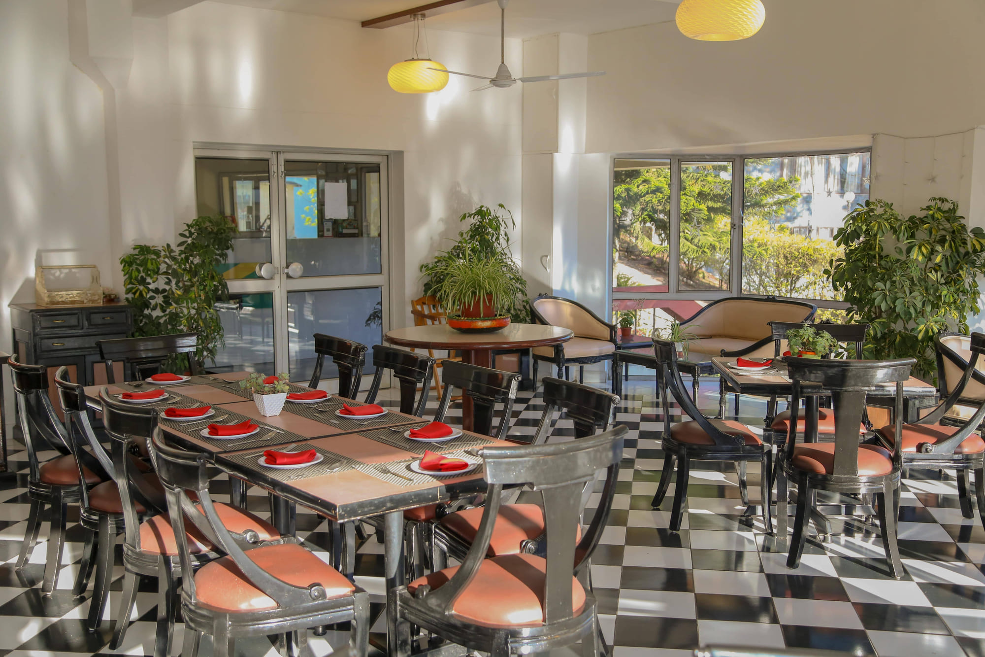 The multi-cuisine restaurant, laid up and lit by the valley windows